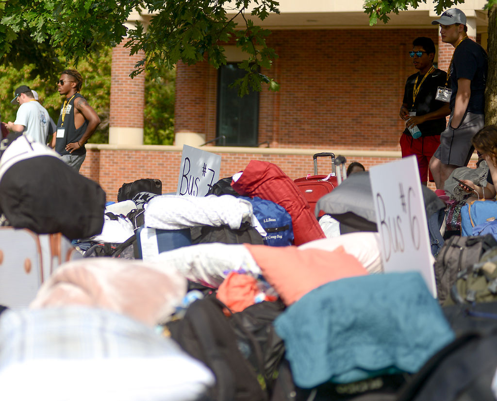 Camp essentials, such as pillows and suitcases, pile up